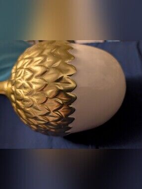 Decorative Gold and White Ceramic Acorn